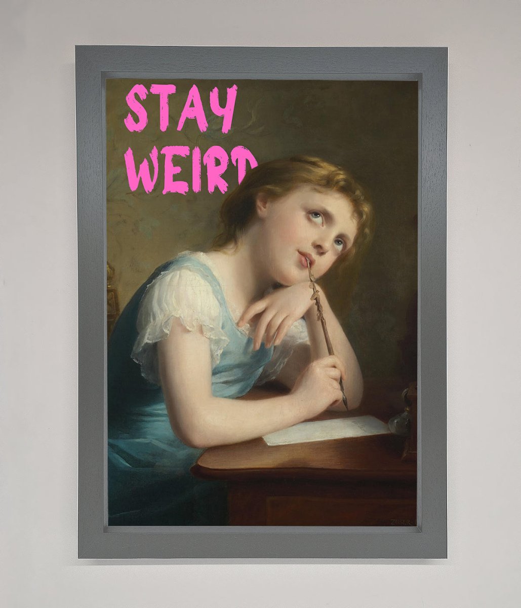 Stay Weird Framed Print